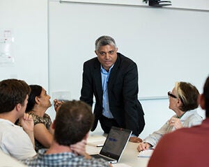 Team listening to presenter during a training exercise